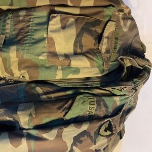 Authentic U.S. Army jacket size Lg. Insignia with “Brady” like new comfortable